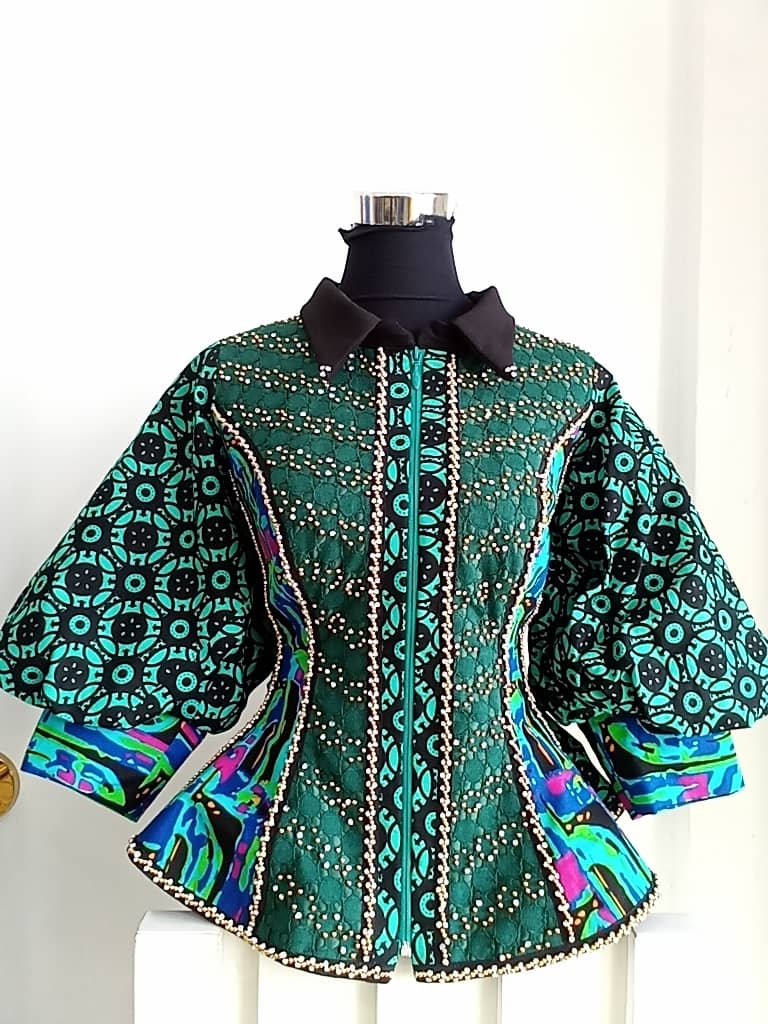 Horizontal jacket with collar and slanting detailing